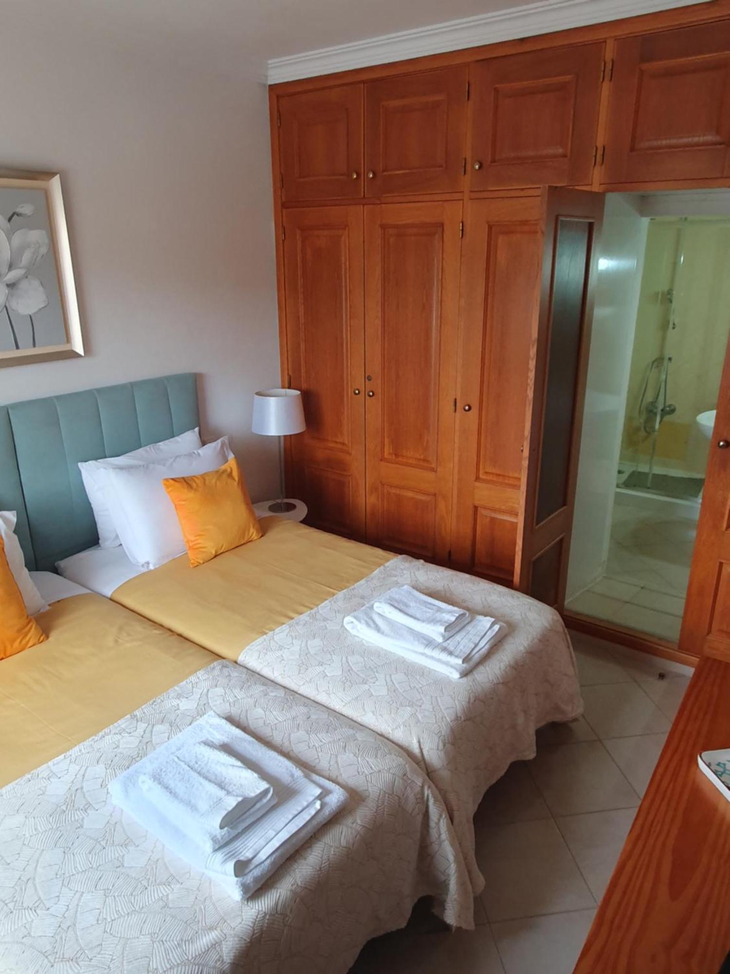 Vila Apartamentos Estrela Lagos Szoba fotó